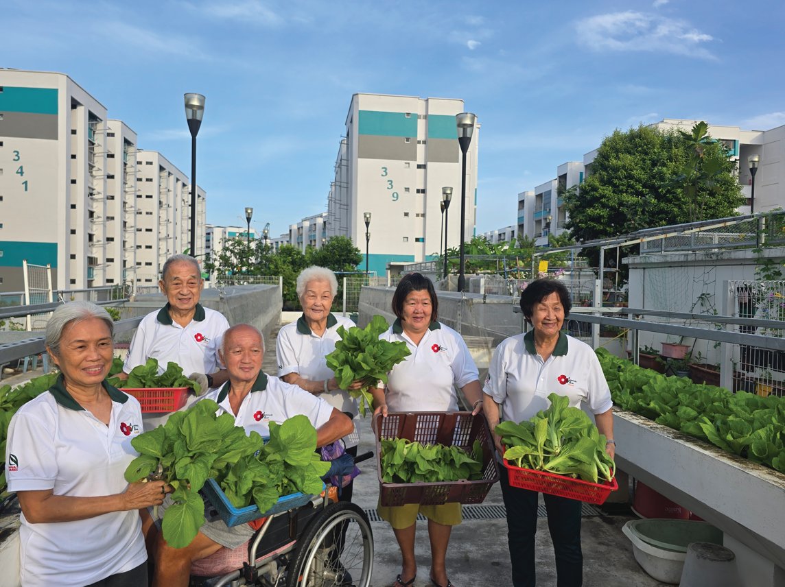 People holding harvested vegetables
